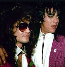 Warren DeMartini, Ronnie Mancuso, Jake E. Lee.