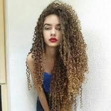 Just twist your curls into two loose and messy buns on either. 50 Long Curly Hairstyles You Ll Fall In Love With Hair Motive