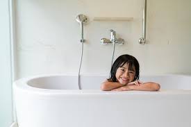 Have everything you need at hand: Premium Photo Sister Help Her Baby Brother Take A Bath