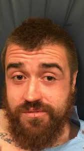 Wanted man holds woman hostage