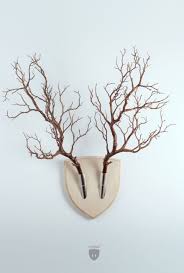 Forget Dead Animals Bring Your Walls To Life With This Plant Wall Trophy Branch Decor Branch Art Plant Wall