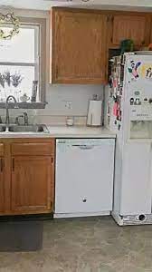 How To Paint Your Kitchen Cabinets Without Sanding Video Kitchen Cupboards Paint Painting Kitchen Cabinets White Kitchen Cabinets Makeover