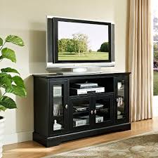 The stand elevates the tv over 5 feet in the air, and many models have a shelf on the contemporary appearance of the modern tv stand for flat screens can contain tvs up to 60 inches. Walker Edison Tall Sound Bar Tv Stand For Most Flat Panel Tv S Up To 60 Black Bb52c32bl Best Buy