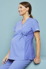 Women's scrub tops with all the fun prints you could ever want such as flowers, hearts, animals, stripes, and much more. Cherokee Flexibles Maternity Mock Wrap Knit Panel Top 2892 Ciel Blue Simon Jersey Healtcare Medical Uniforms