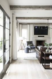 Love The Look Of The Rustic Wood Beams The Light Wood Floors And The Home Furnishings Including Th Modern Rustic Homes Modern House Design Rustic Wood Floors