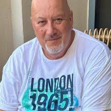 Who's the person in the middle?