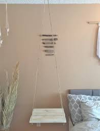 A suspended side table creates a dramatic effect. Hanging Nightstand Floating Nightstand Suspended End Table White Night Stand Bed Side Table Boho Bohemian Bedroom Decor Minimalist Coastal Floating Nightstand Boho Side Table Bohemian Bedroom Decor