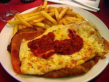 Using a meat pounder, a heavy skillet, or a rolling pin, gently pound the meat. Milanesa Wikipedia