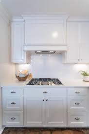 Perhaps, white subway tiles are the most ubiquitous tiles that are used for backsplash. Modern White Kitchen With White Subway Tile Backsplash Hgtv