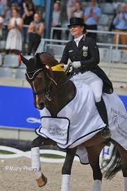 Isabell werth enters the dressage manège with all the composure of a queen, floating down the centerline to greet the judges with a perfectly square halt. Wellington Dressage 5 Week Begins With Isabell Werth Horses Daily