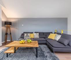 The rug in this picture is a particularly good choice for a grey couch (as evidenced by the grey chair) because the teal pops out from navy blue base color, which is another incredible complement to grey. 15 Trendy Ideas For What Color Rug Goes With A Gray Sectional In 2021