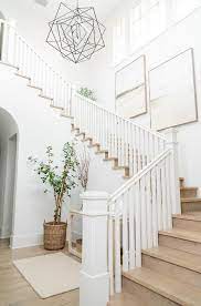 20 White Rooms Design Matters Staircase Wall Decor Cottage Foyer Stair Wall Decor