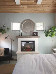 When we remodeled our master bedroom for the one room challenge, i was bound and determined i was going to include a diy faux fireplace and mantel. Diy Electric Fireplace Domestic Imperfection