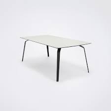 Offered in white or black is an exceptionally durable plastic surface. Float Dining Table Houe