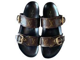 Iconic french fashion house louis vuitton was founded in 1854 and has since become an international luxury fashion powerhouse. Louis Vuitton Monogram Slides Sandals Eu36 Ref 144920 Joli Closet