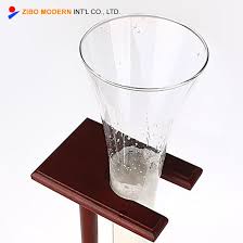 This distinctive and unusual style makes a great conversational piece at parties! China Wholesale Clear Half Drinking Ale Beer Glass Long Yard Of Beer Glass With Wooden Holder Stand China Yard Of Beer Glass And Yard Long Beer Glass Price