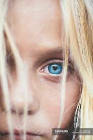 By talking with your child at a young age about sexual orientation and gender identity, . Close Up Shot Of Beautiful Blonde Preteen Girl Partial View Of Blue Eye Female Candid Stock Photo 176898998
