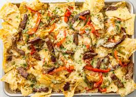 Crispy chips with melted cheese, ground beef, refried beans, and all of your favorite toppings. 50 Homemade Nachos Recipes How To Make Nachos
