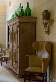 Decorate The Top Of An Armoire Chatfield Court Top Of Cabinet Decor Decor Cabinet Decor