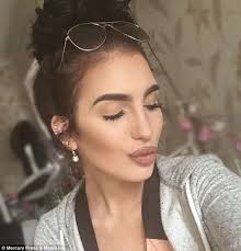 Make-up artist Eve Morrison who had a lip tattoo claims she's been scarred  for life