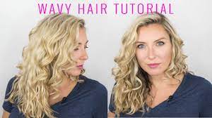 Snag this look by parting your hair down the middle and using a straightener to flip your bangs away from your face, starting at your ears. How To Style Your Natural Wavy Hair Youtube