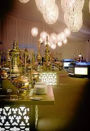 A Lavish Buffet Offering An Extensive Range Of Arabic Delicacies And Family Favorites Complimented By Inte Ramadan Decorations Tent Decorations Moroccan Party