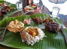 Typical Kerala Meals On Plantain Leaf With Fish Fry Curry Food Recipes From Heaven Foodie Recipes