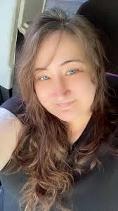 woman struggling with perimenopause symptoms