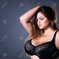 Plus Size Sexy Model In Black Bra, Fat Woman With Big Natural Breast On  Gray Studio Background, Overweight Female Body, Long Hair And Make-up Stock  Photo, Picture and Royalty Free Image. Image