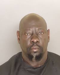 Woman survives misfires and stabbing, aggressor arrested and charged