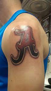 Tattoo on hand men in the style of biomechanics. Alabama Tattoo Roll Tide Alabama Tattoos Tattoos Cool Tattoos