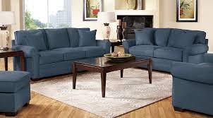2.a brown sofa covered in a velvet textured fabric. Blue White Brown Living Room Furniture Decorating Ideas