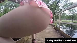 My oh my! Sexual deviant, Sunny Lane, hikes up her summer dress & stuffs  her pretty pussy with her tiny fingers, on a secluded bridge! Lets watch!  Full Video & Sunny Lane