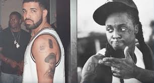 He features full body tattoos, custom dreadlocks, and white leopard pants. Drake Tattoos Lil Wayne S Image On His Arm And It S Intriguing