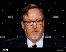 Mark Barnhill, Platinum Equity Principal, introduces Detroit Pistons new  head coach Dwane Casey at the NBA basketball teams arena in Detroit,  Wednesday, June 20, 2018. (AP Photo/Paul Sancya Stock Photo
