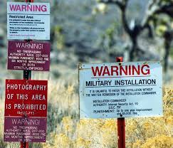 The driver was ejected from the vehicle, which caught fire. Area 51 Front Gate
