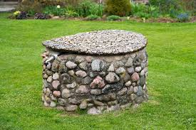Deep well subversive pumps feature a single pipe that sits inside a well and connects to a pressure tank. 17 Outdoor Well Cover Ideas With Photos Upgraded Home