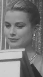Rare footage of Grace Kelly receiving the Neiman Marcus Fashion Award for  “Best Dressed Woman” from Marcus Stanley