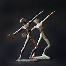 A javelin is a light spear designed primarily to be thrown, historically as a ranged weapon, but today predominantly for sport. Discus Thrower Bronze Art Sculpture Discobolus Greek Athlete Statue Ancient Greece Olympic Games Art Decor