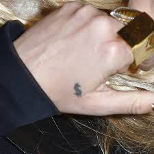 If you want everyone to see, you can have the size of the dollar enlarged. Kesha Dollar Sign Back Of Hand Tattoo Steal Her Style