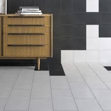 In muted black and chalky white tones, this unique patterned tile features a star constructed of geometric shapes at its center. Fitzgrovia White And Black Wall Floor Tiles Luxury Tiles