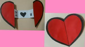 To complete the card, glue it onto a colored piece of paper for backing. How To Make An Easy Paper Heart With A Message Using Origami Paper Diy Greetings Cards Youtube