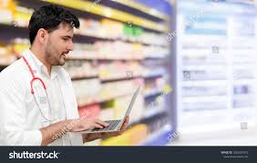 Pharmacist Or Doctor Using Laptop Computer At The Pharmacy Room Medical Healthcare And Pharmaceutical Staff Service Pharmacist Photo Editing Laptop Computers