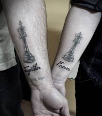 It is necessary to have the exact matching font for the king and queen tattoos or otherwise it will look meaningless. King Queen Chess Piece Tattoo Wiki Tattoo