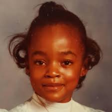 It's my personal holiday friends and this one's a big deal. We've reached  Golden Jubilee status people! This is me in kindergarten, my first school  pic. I wore a slate blue dress