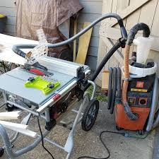 Dust Collection On The New Skilsaw Spt99 12 Worm Drive Table Saw Is Quite Good With Only The 2 5 Rear Port I Added A Dewal Skil Saw Table Saw Dust Collection