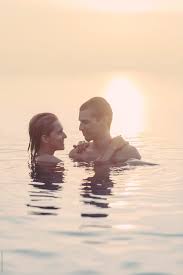 Couple In The Infinity Pool At Sunset By Mosuno Stocksy United Stock Stockphoto Couple Love Infinitypool Infinity Pool Love Photos Couples