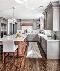 Kitchen Gray Shaker Cabinets Wood Island W Matching Wood Vent Hood Marble Countertop Farmhouse Kitchen Remodel White Kitchen Remodeling Grey Kitchen Designs