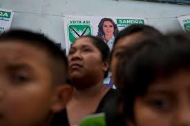 Guatemalan presidential candidate Sandra Torres leans
