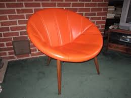 vintage mid century modern saucer chair with orange vinyl upholstery saucer chairs chair mid century modern